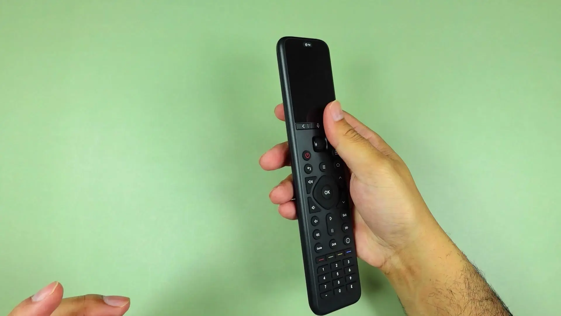 The SofaBaton U3 remote seen from the side, showing its tall matte black body and rounded, ergonomic profile