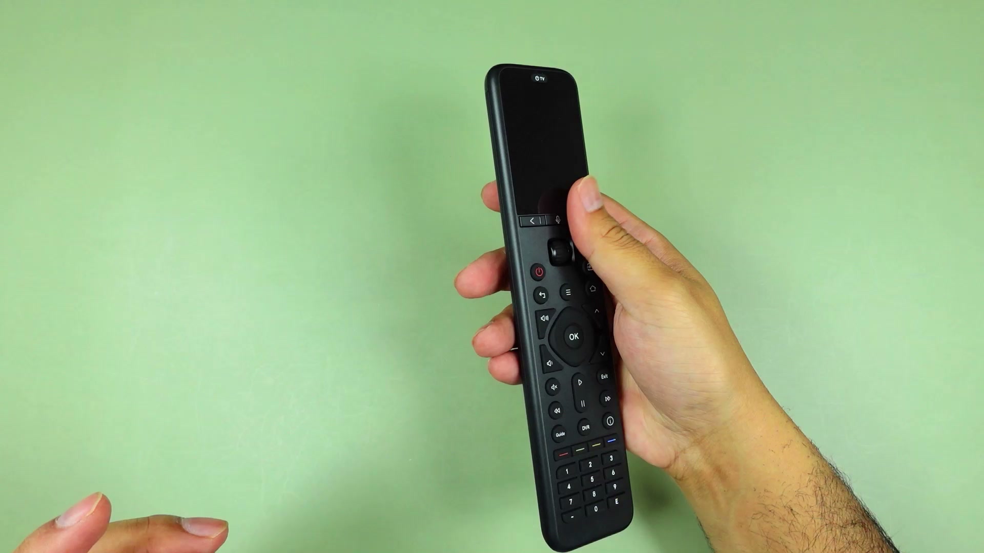 The SofaBaton U3 remote seen from the side, showing its tall matte black body and rounded, ergonomic profile